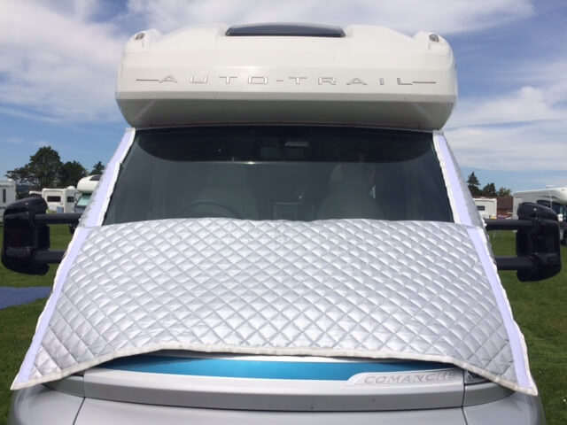 Silver motor-home screen protector on silver and white auto-trail motor-home 